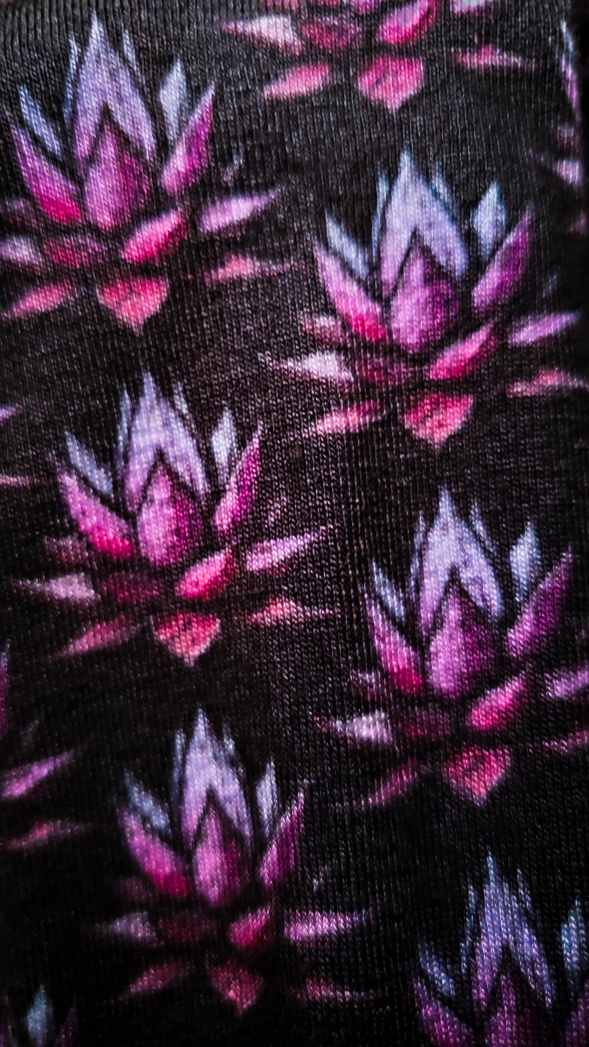 Close-up of bewitching socks featuring purple agave twilight horror design, emphasizing the dark hues."