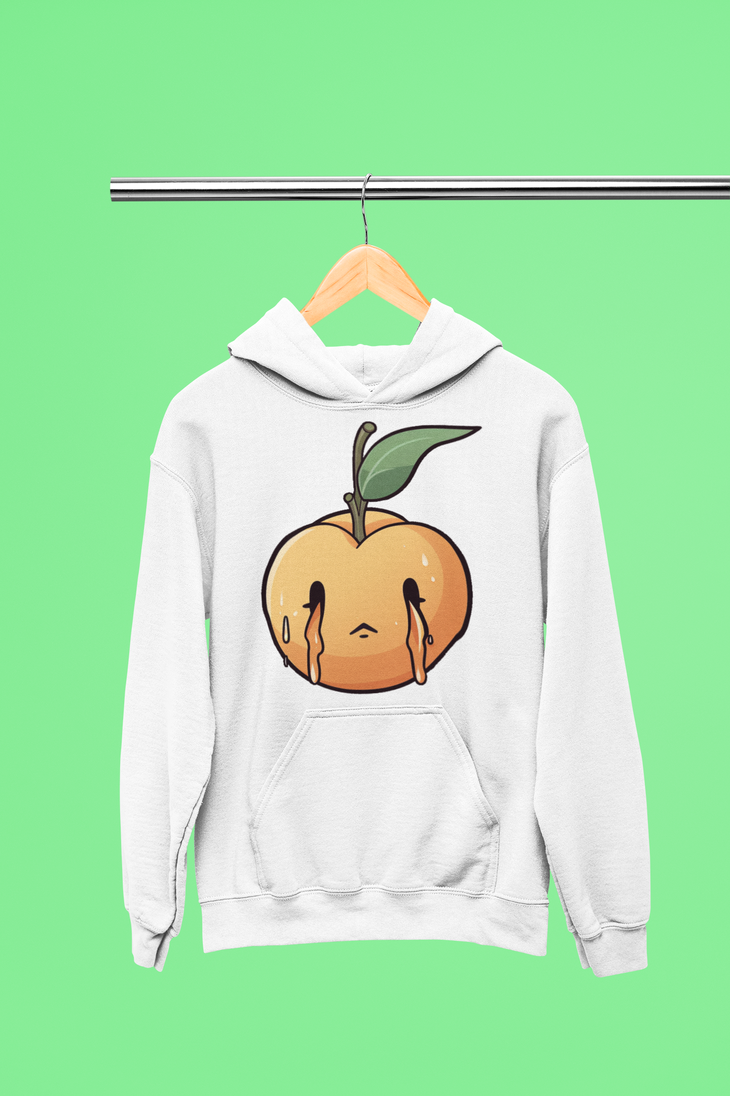 White hoodie on a hanger featuring a melting peach design, presented against a green background.