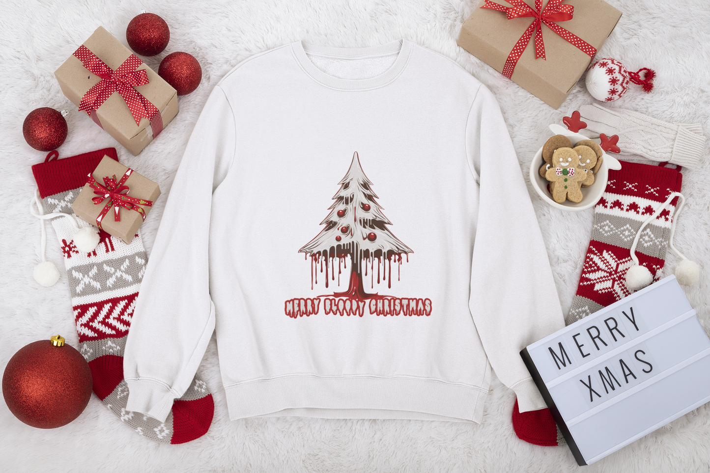 Cream sweatshirt with "Merry Bloody Christmas" tree design surrounded by holiday decorations and gifts.