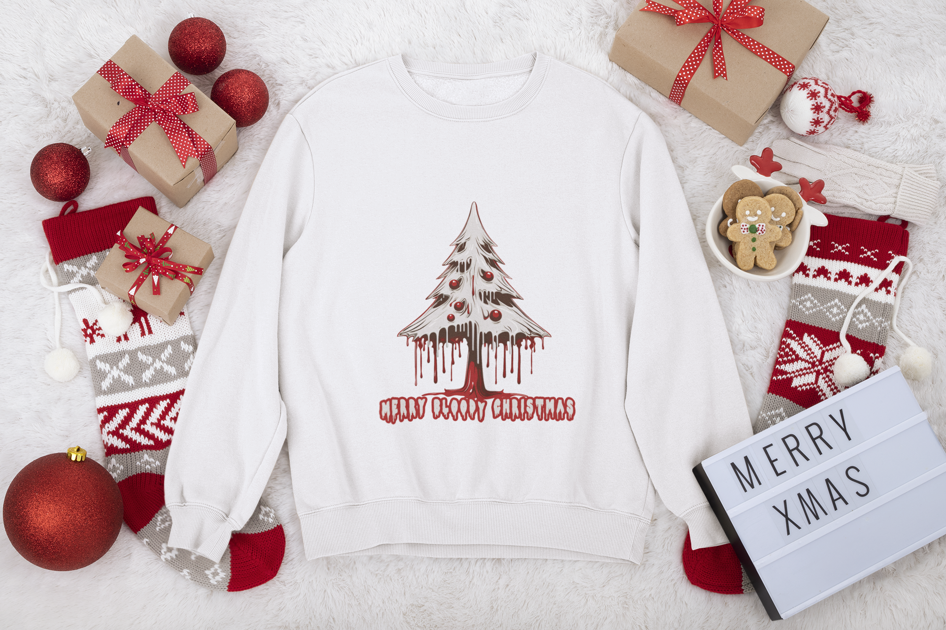 Cream sweatshirt with "Merry Bloody Christmas" tree design surrounded by holiday decorations and gifts.