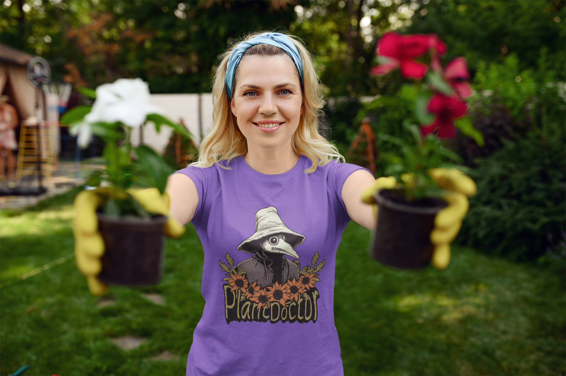 Team purple t-shirt on a woman presenting potted flowers, with a 'Plant Doctor' design, merges gardening passion with a playful, vibrant style.